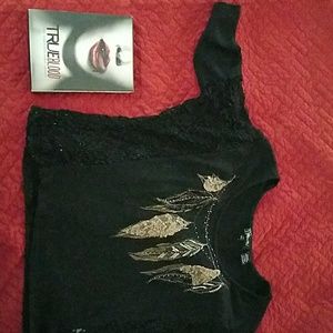 Black miss me top with feather accents